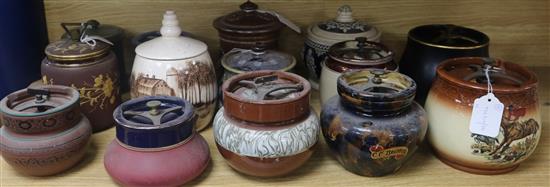 A Doulton tube-lined tobacco jar and fourteen other tobacco jars, various (15)